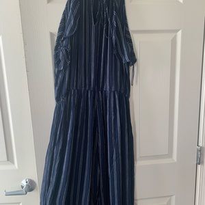 Woman’s Aeropostale woman’s Navy blue and white striped Jump Suit.